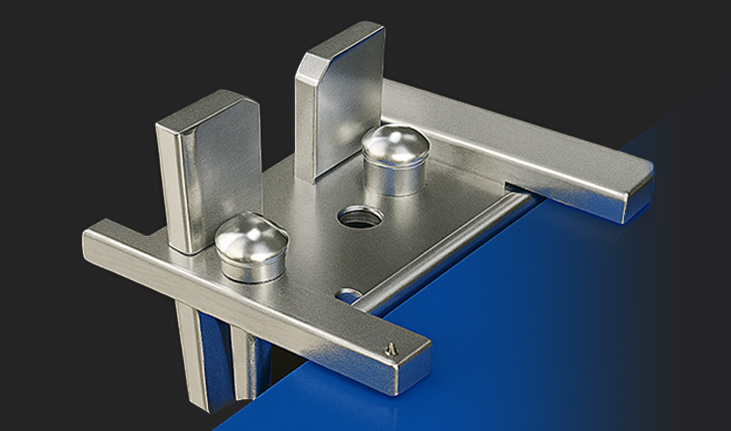 Emplacement pour ranger les coins de serrage